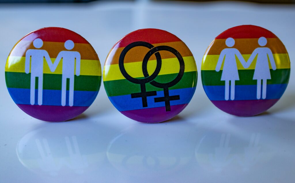 LGBTQ flag buttons or pins